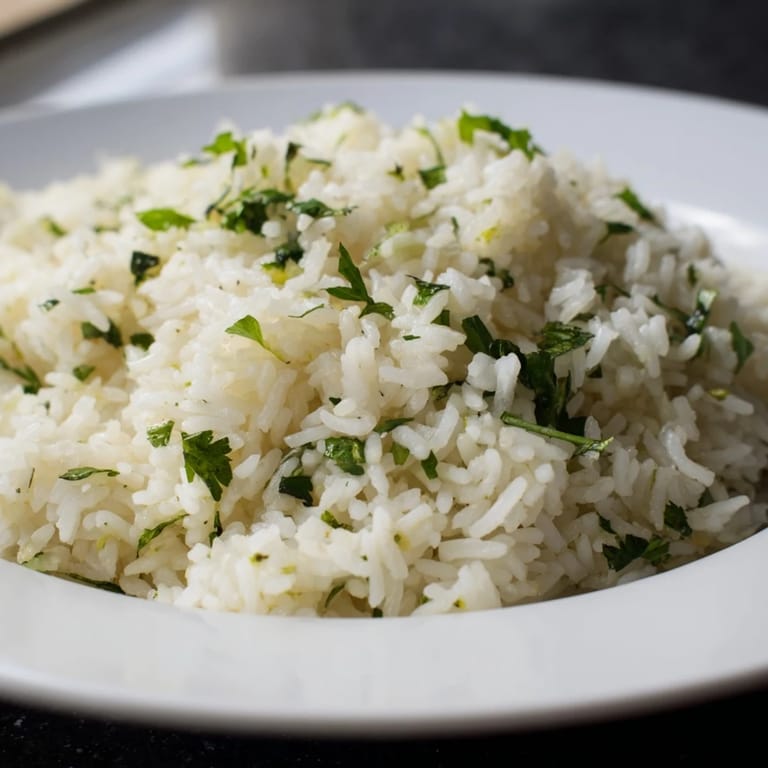 Fresh cilantro lime rice, ready to serve, a flavorful accompaniment to tacos or grilled chicken.