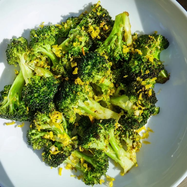 Golden and tender, this Lemon Garlic Roasted Broccoli is tossed with fresh lemon zest.